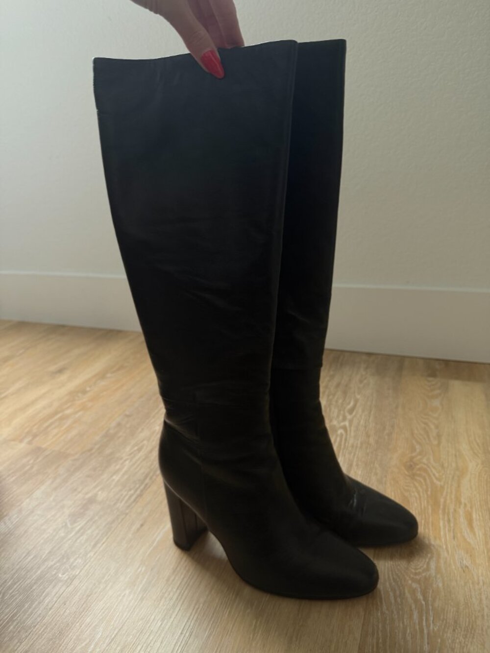 Tony Bianco "Bellez" knee-high leather boots in black.